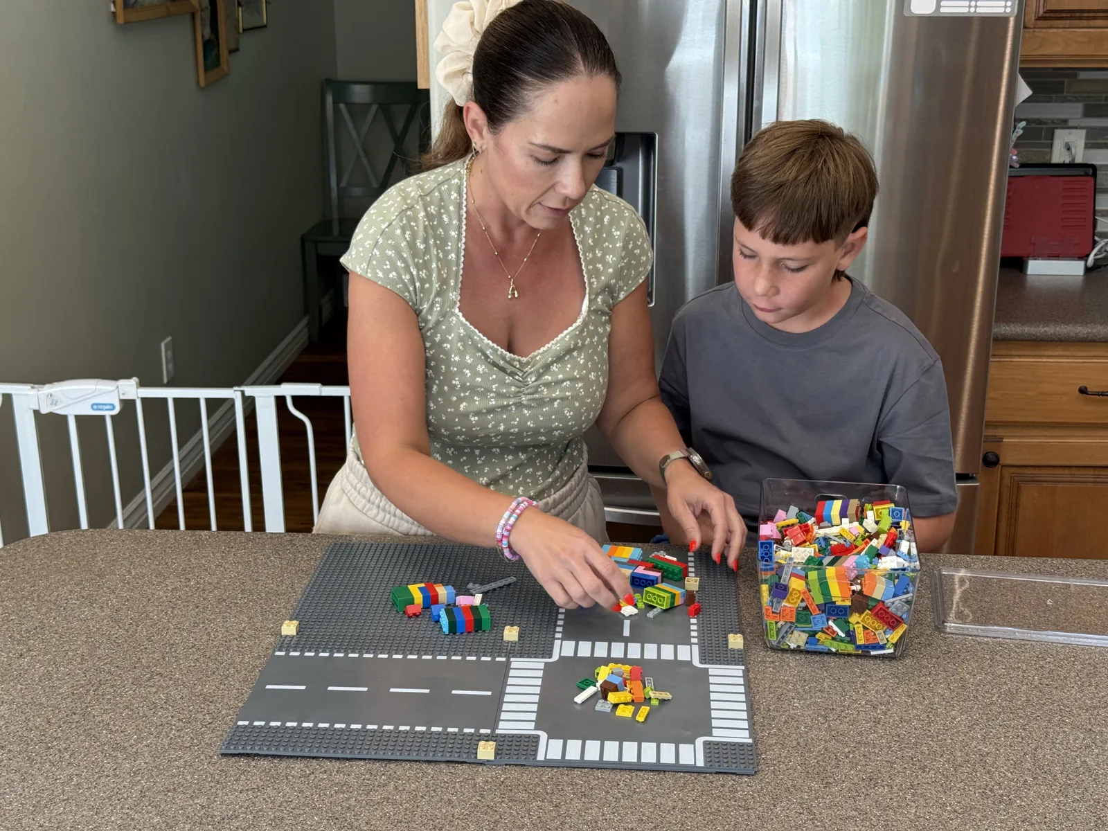 Family building bricks using a Slab Dream Lab baseplate.